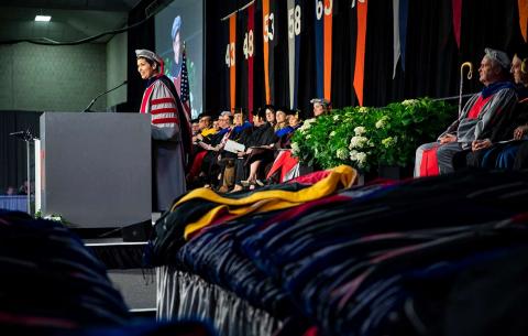 Hooding speaker Candis Callison addresses MIT's newest doctors