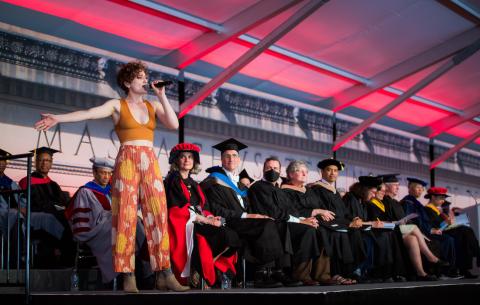 Image of Quinn Brodsky singing at the Undergraduate Ceremony