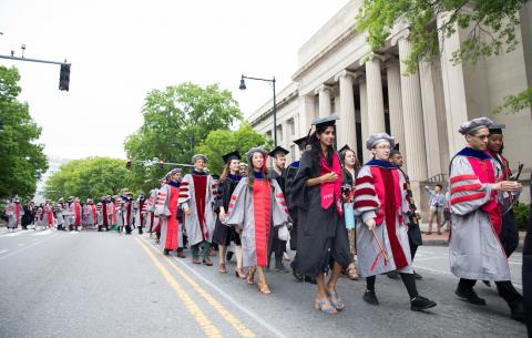 Image of graduates processing to Killian Court 