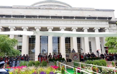 Image of the Commencement stage, in front of the Lobby 7 building and the Great Dome